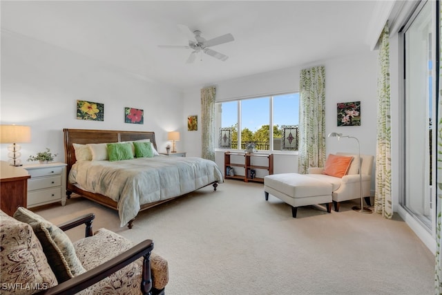 bedroom with light colored carpet and ceiling fan