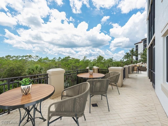 view of patio with a balcony