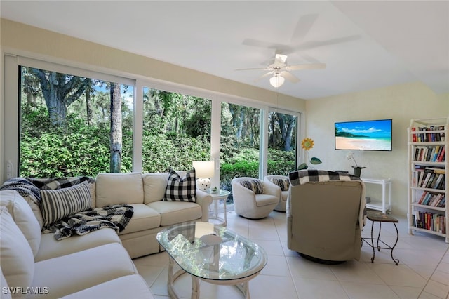 tiled living room featuring ceiling fan