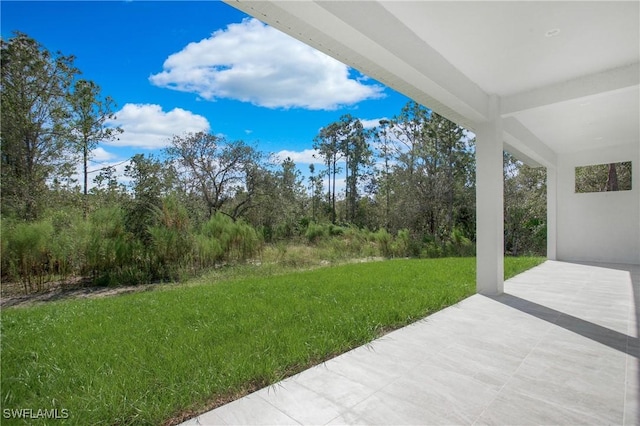 view of yard with a patio area