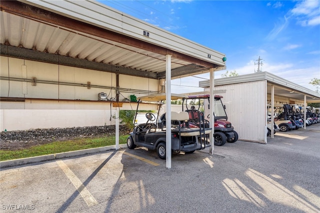 view of vehicle parking with a carport