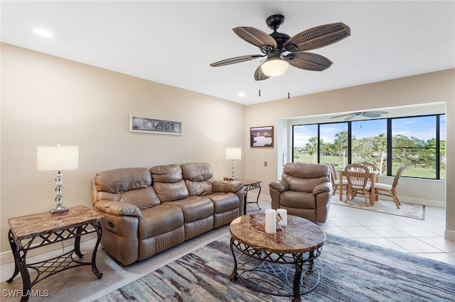 tiled living room featuring ceiling fan