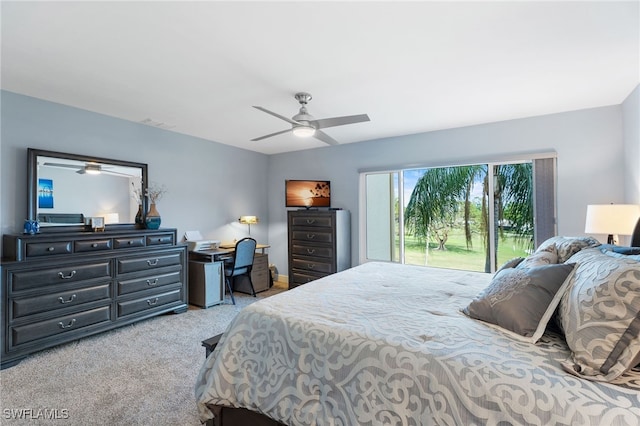 carpeted bedroom featuring access to exterior and ceiling fan