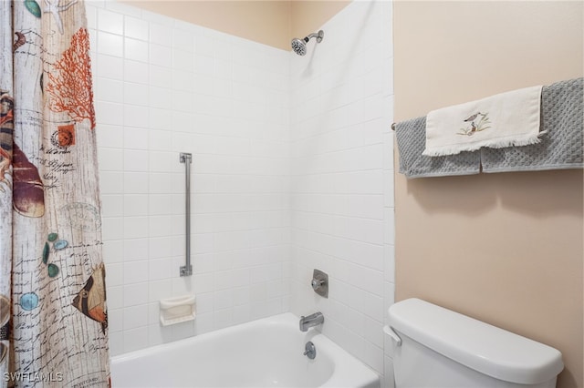 bathroom with toilet and shower / tub combo with curtain