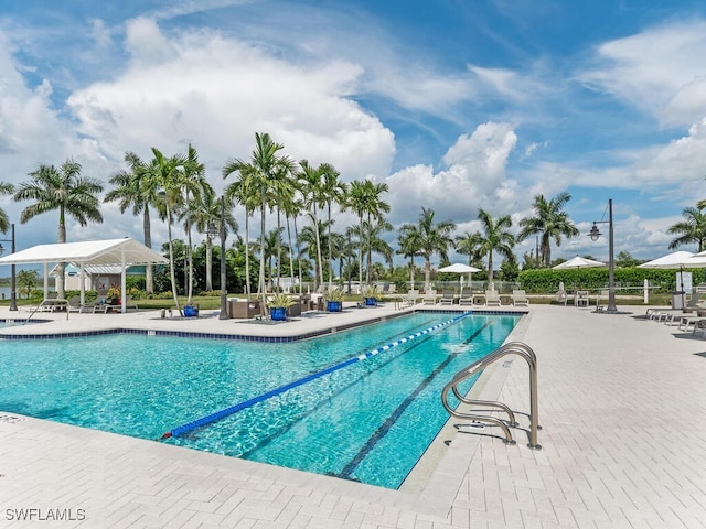 view of pool with a gazebo and a patio