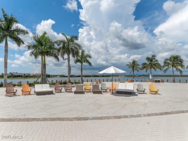 view of patio featuring a water view