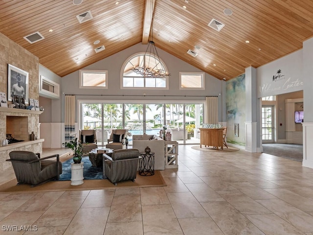 living room with wood ceiling, a large fireplace, high vaulted ceiling, and light tile patterned floors