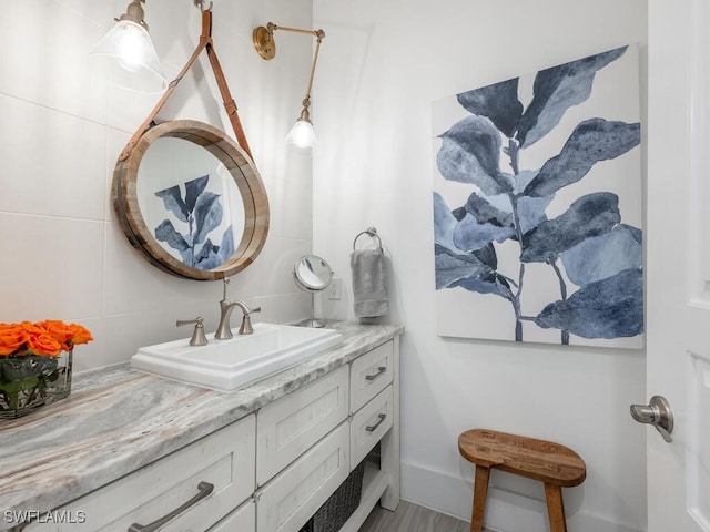 bathroom with vanity and backsplash