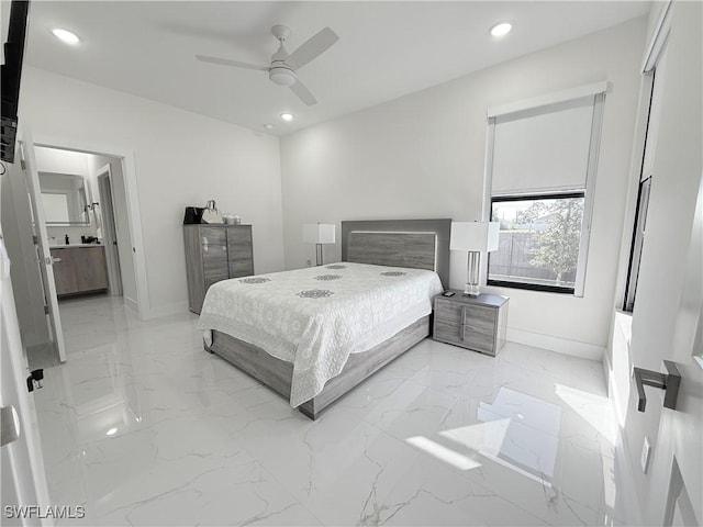 bedroom with connected bathroom and ceiling fan