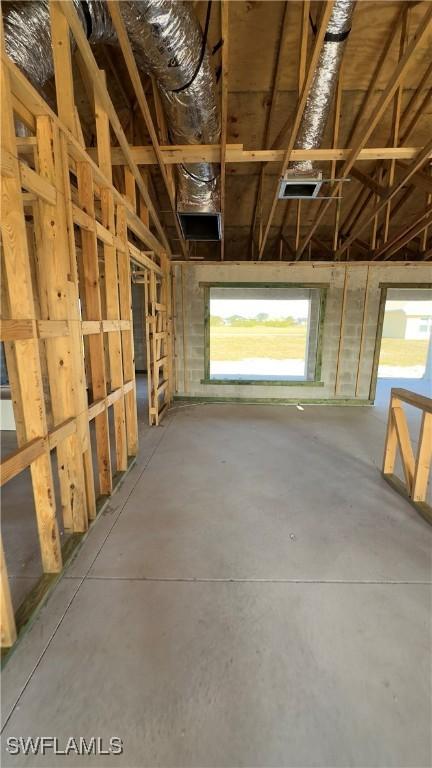 miscellaneous room with concrete flooring