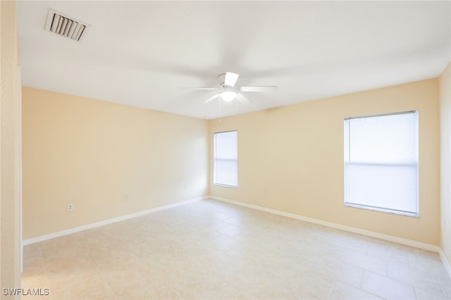 empty room featuring ceiling fan