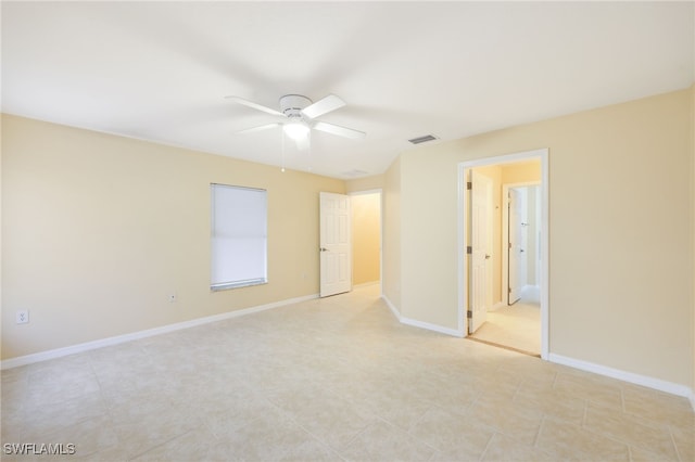 unfurnished room featuring ceiling fan