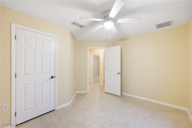 spare room featuring ceiling fan