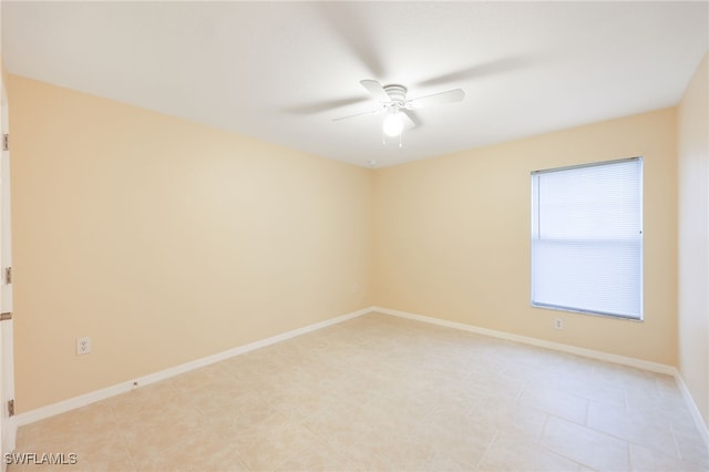 unfurnished room with ceiling fan