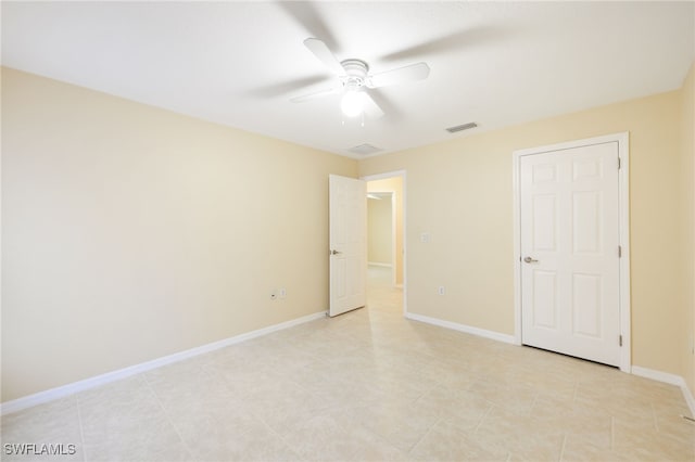 unfurnished bedroom featuring ceiling fan