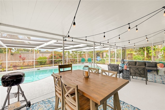 view of pool featuring a lanai, an outdoor hangout area, a patio area, and a grill