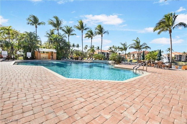 view of swimming pool featuring a patio