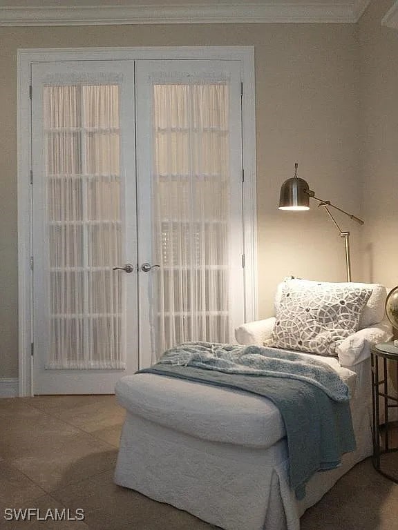 bedroom featuring crown molding