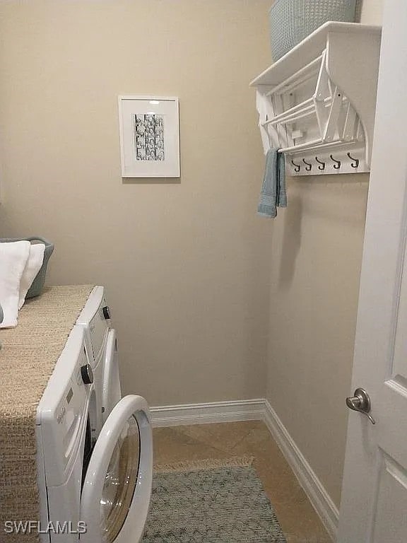 laundry room featuring independent washer and dryer