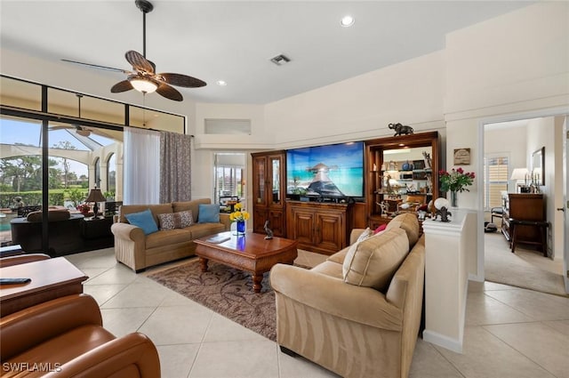 20273 Leopard Ln, Estero, FL 33928 - living room with light tile patterned floors, ceiling fan, and recessed lighting