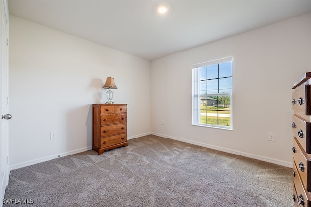 unfurnished bedroom featuring light colored carpet