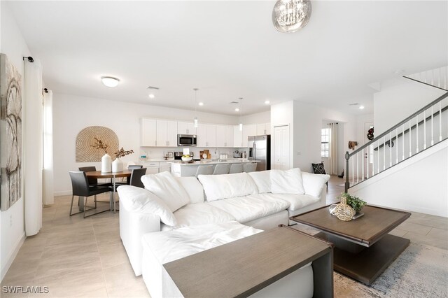 living room featuring light tile patterned flooring