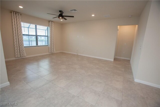 spare room featuring ceiling fan