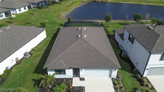 drone / aerial view with a water view