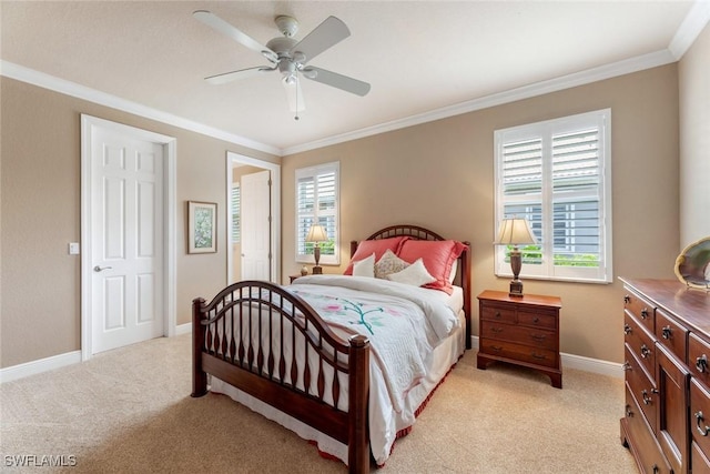 bedroom featuring ceiling fan, light colored carpet, multiple windows, and crown molding