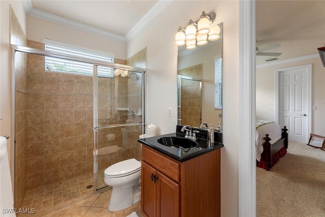 bathroom featuring vanity, toilet, walk in shower, ornamental molding, and ceiling fan