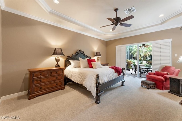 bedroom featuring ceiling fan, access to exterior, crown molding, and a raised ceiling