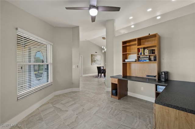 office area with ceiling fan and vaulted ceiling