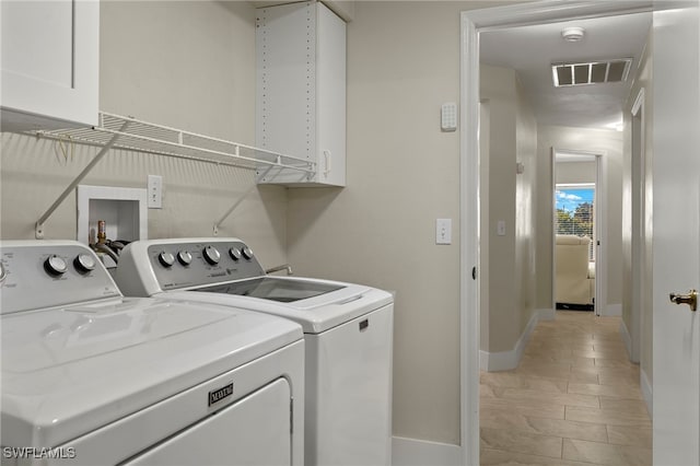 laundry area with washer and clothes dryer