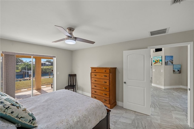 bedroom featuring access to exterior and ceiling fan