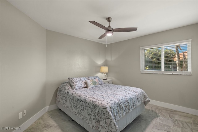 bedroom featuring ceiling fan