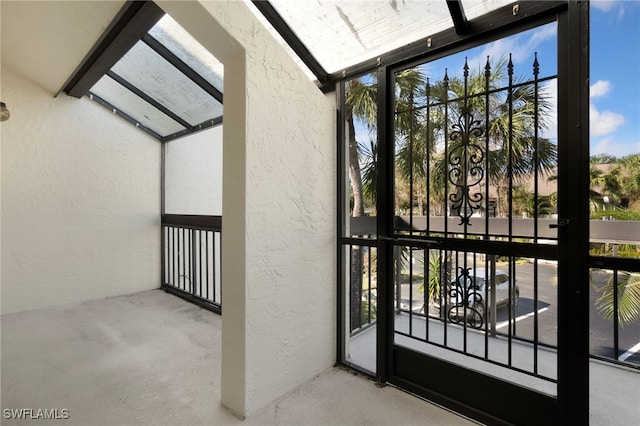 entrance to property with a balcony