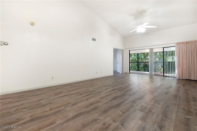 unfurnished room featuring dark hardwood / wood-style floors, high vaulted ceiling, and ceiling fan