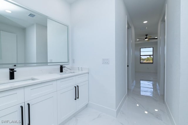 bathroom with ceiling fan and vanity