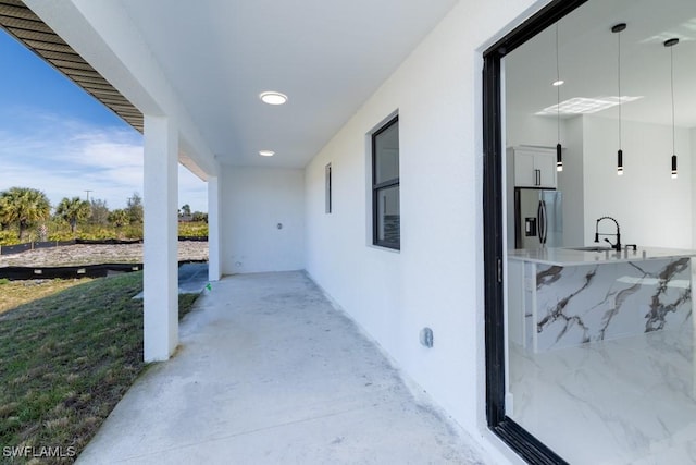 view of patio / terrace featuring sink