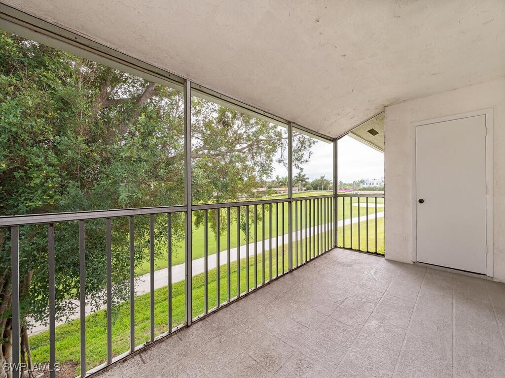 unfurnished sunroom featuring a wealth of natural light