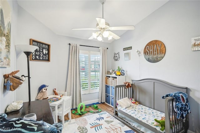 bedroom featuring ceiling fan and wood-type flooring