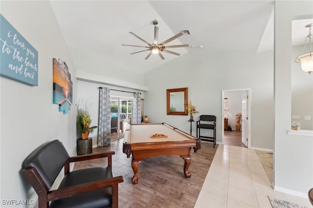 rec room with ceiling fan, pool table, high vaulted ceiling, and light tile patterned floors