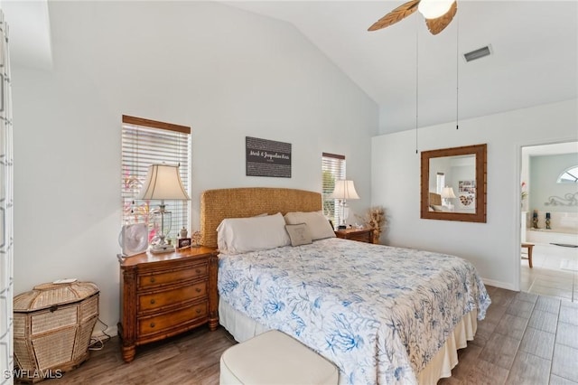 bedroom featuring wood-type flooring, high vaulted ceiling, and ceiling fan