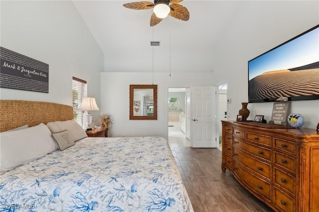 bedroom featuring ceiling fan, wood-type flooring, and high vaulted ceiling