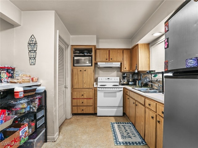 kitchen featuring appliances with stainless steel finishes and sink