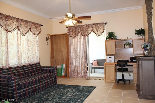 tiled office space featuring ceiling fan and ornamental molding