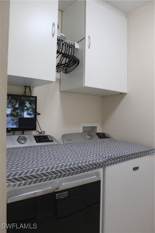 interior space featuring washing machine and dryer