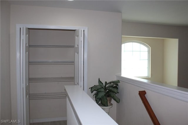 hall featuring hardwood / wood-style floors