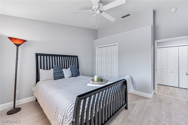 bedroom with ceiling fan and light hardwood / wood-style floors