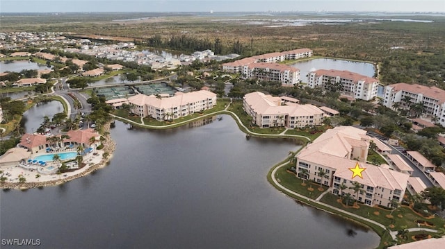 drone / aerial view featuring a water view